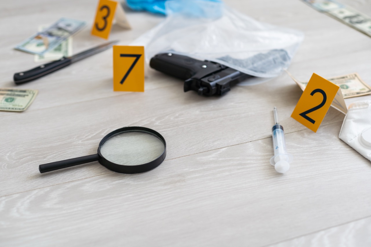 crime-scene-concept-with-a-gun-and-evidence-marker-2025-01-10-02-23-49-utc-1.jpg