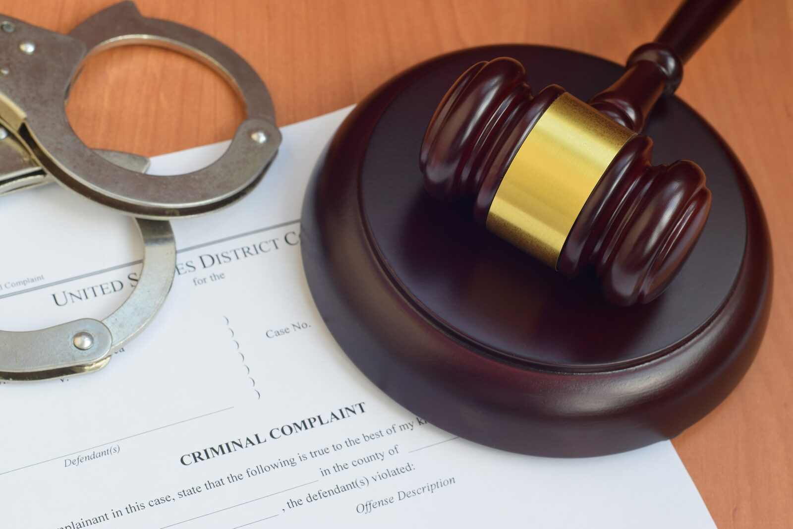 Criminal protective order form on a courtroom counsel table in Orange County